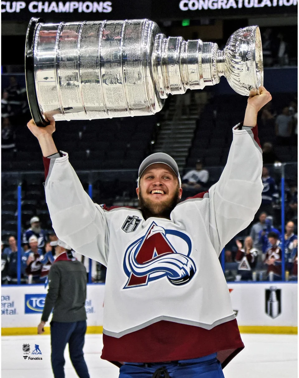 Supreme Logan O'Connor Colorado Avalanche Unsigned 2022 Stanley Cup Champions Raising Cup Photograph